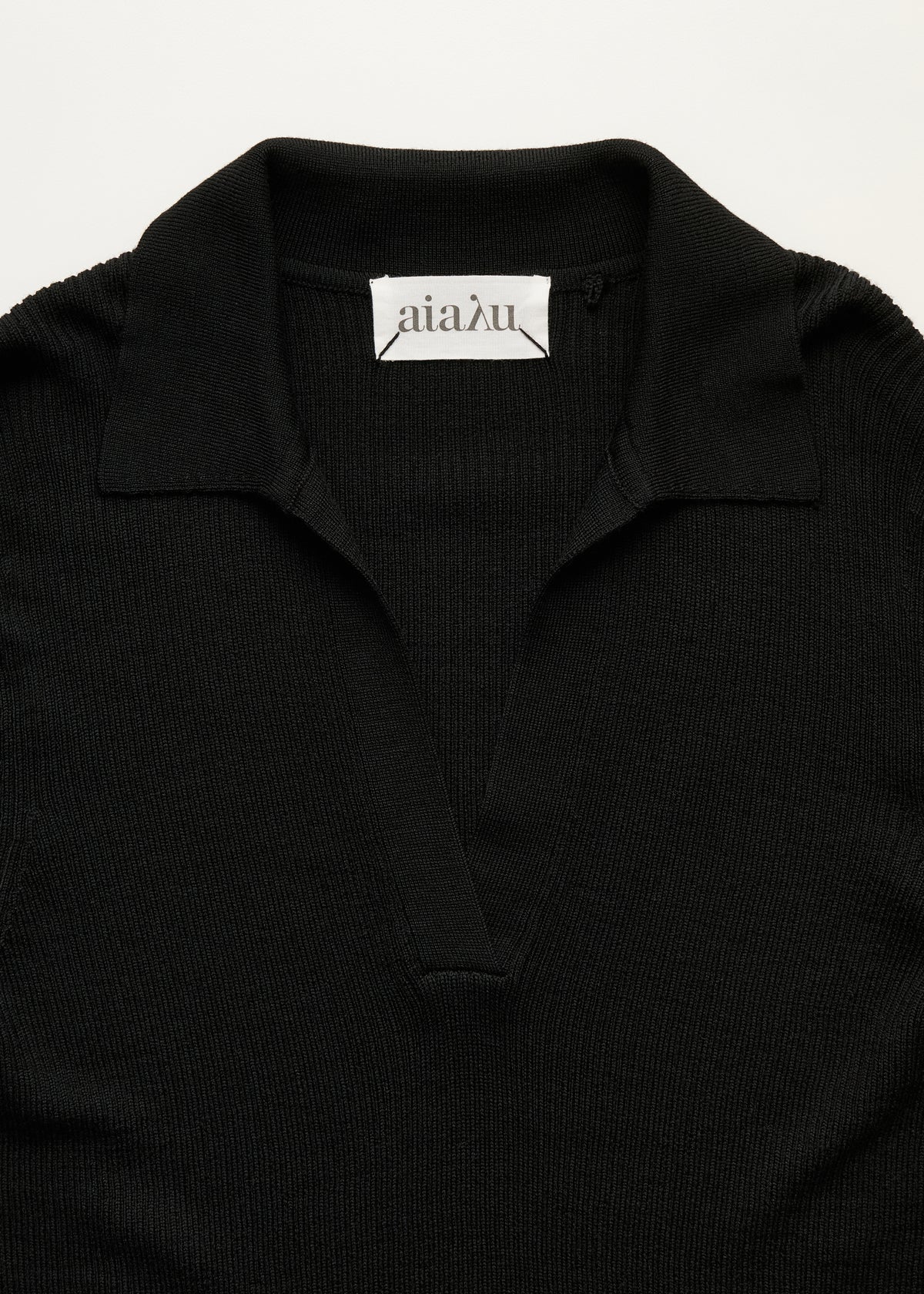 Noa polo blouse - merino wool | Black Blouse aiayu